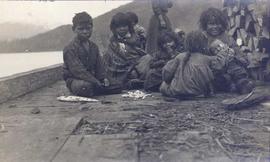 Group of First Nations children on a dock