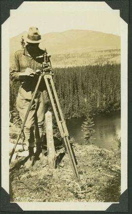 Al Phipps taking measurements at a river station