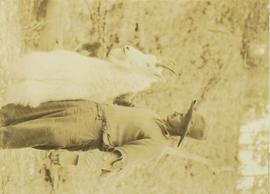 Guide Bruce Otto holding up large mountain goat shot by Prentiss Gray