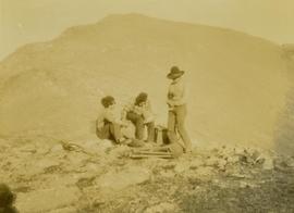 (L-R) Billy Taylor, Johnny Napolean and Pete Callao take a break on a rocky mountain peak