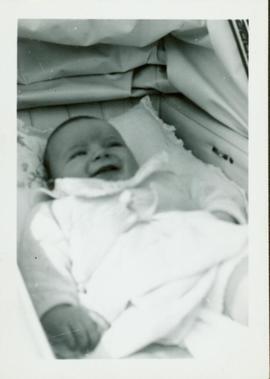 Family photographs from England: Baby John lying in his carriage