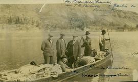 Premier Brewster and the Hon. T.D. Pattullo and party in a boat on the Peace River