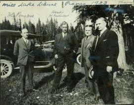 Group photo taken outside featuring Harry Perry, Hon. W. Sutherland, Hon. T.D. Pattullo, and M. Manson