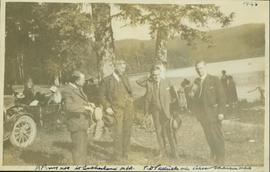 Harry Perry stands with William Sutherland (MLA), T.D. Pattullo (MLA) and Alex Manson (MLA) at a Liberal Party picnic