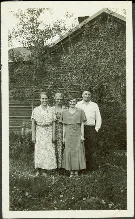 Bob Baxter with Mother and Sisters in Front of House