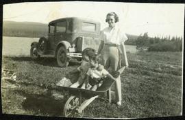 Young Alan and Fred Baxter Being Pushed in Wheelbarrow 