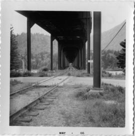 CPR rail with overhead road bridge in Hope