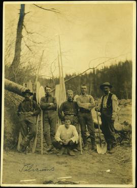 Six Men Standing with Oars & Poles