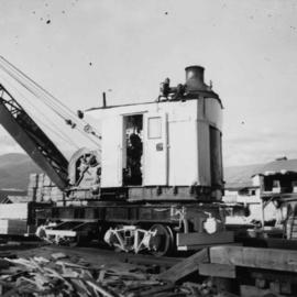 Steam crane in yard of Lions Gate Lumber Co.