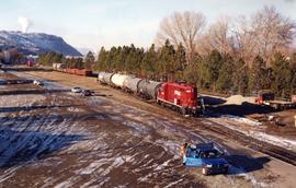 CP delivering tank cars at an interchange track