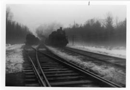 Two steam locomotives approaching